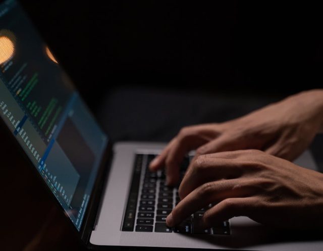 person using silver and black laptop computer